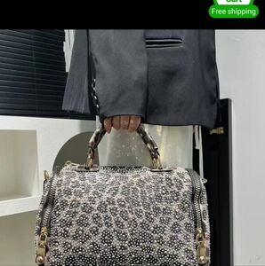 Elegant Black and White Patterned Handbag